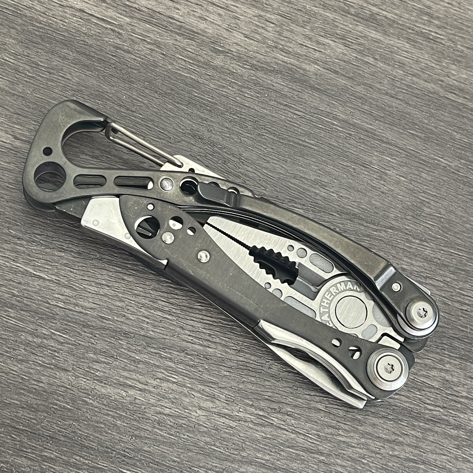 Early Leatherman Skeletool CX Carbon Fiber Handle Insert & Half-Serrated Blade