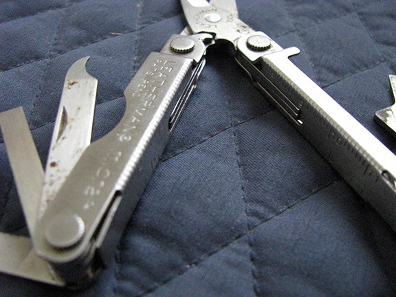 Letherman Multi mini Tool with case.
