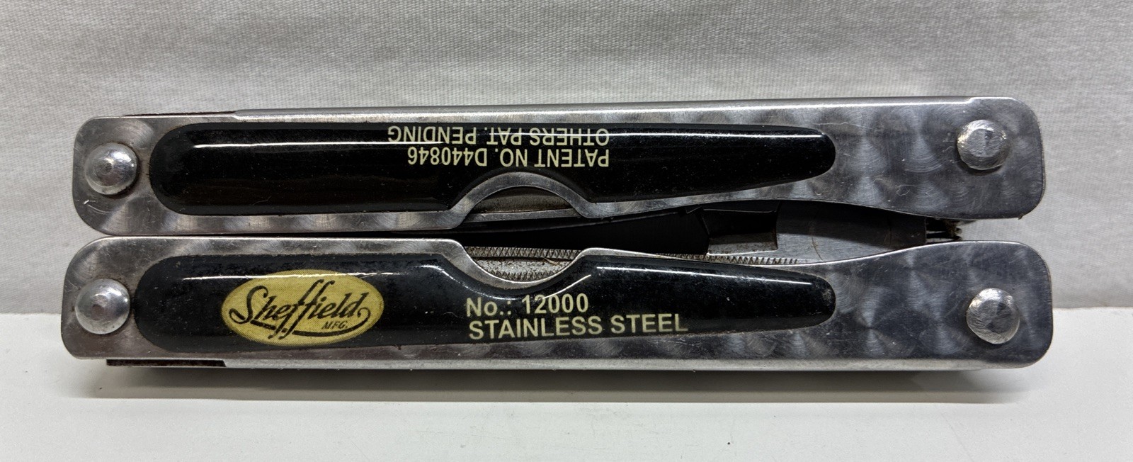 SHEFFIELD MODEL 12000 STAINLESS STEEL FOLDING MULTI-TOOL