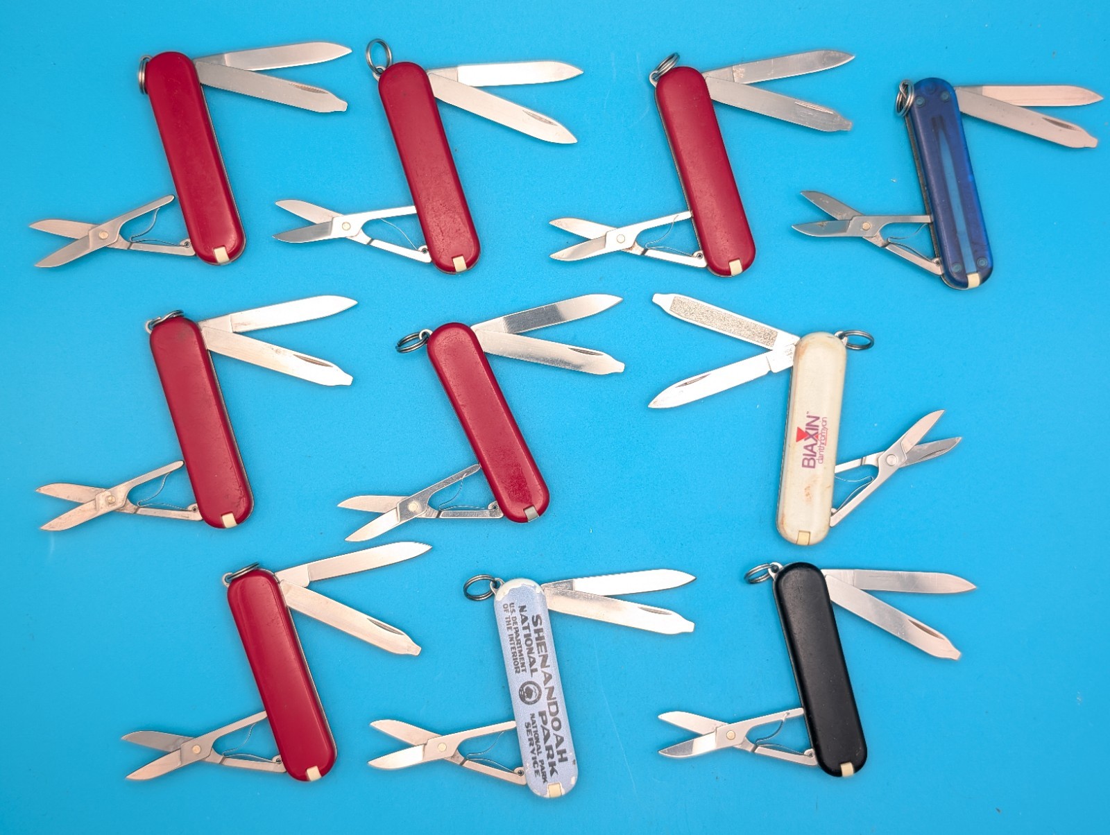 Lot of 10 Victorinox Classic Swiss Army Knife Multi Tools!