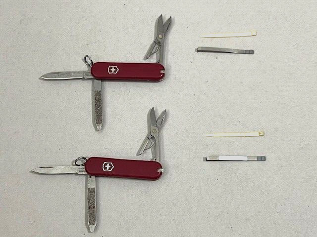 Lot of 2 Victorinox Swiss Army RED MULTI TOOLS – Great condition
