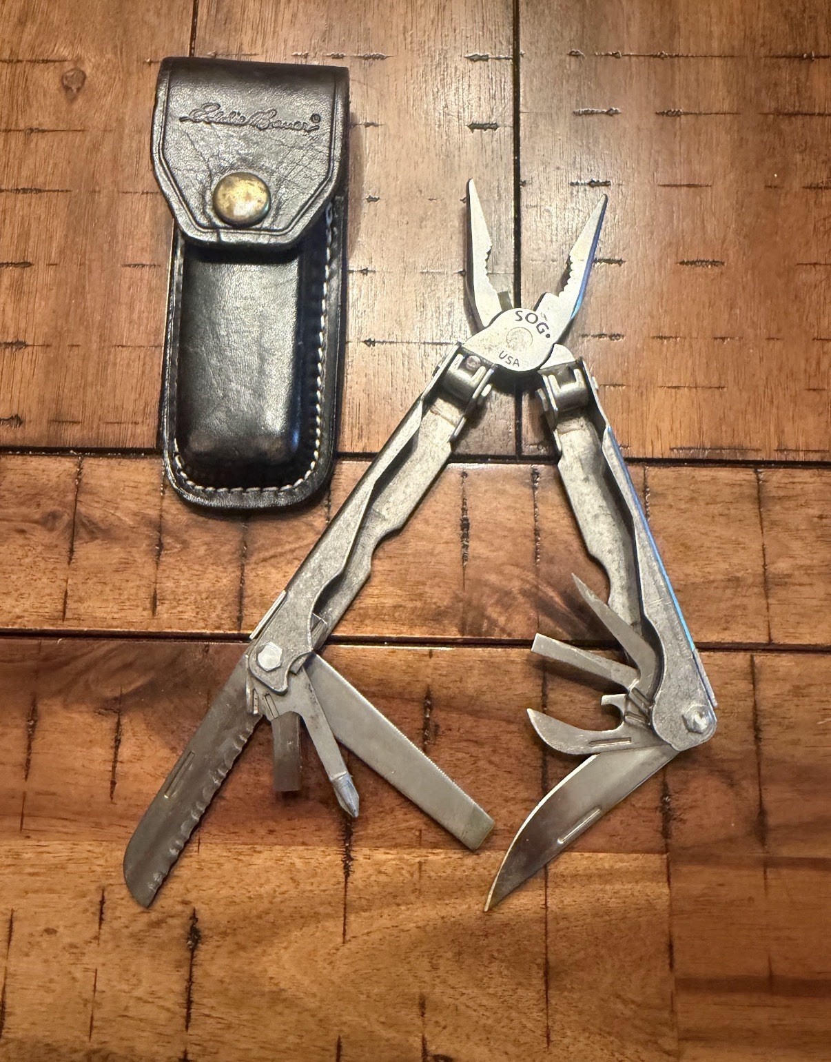 SOG Multi-Tool Stainless Steel Partially Serrated Blade Leather Sheath 7 Tools