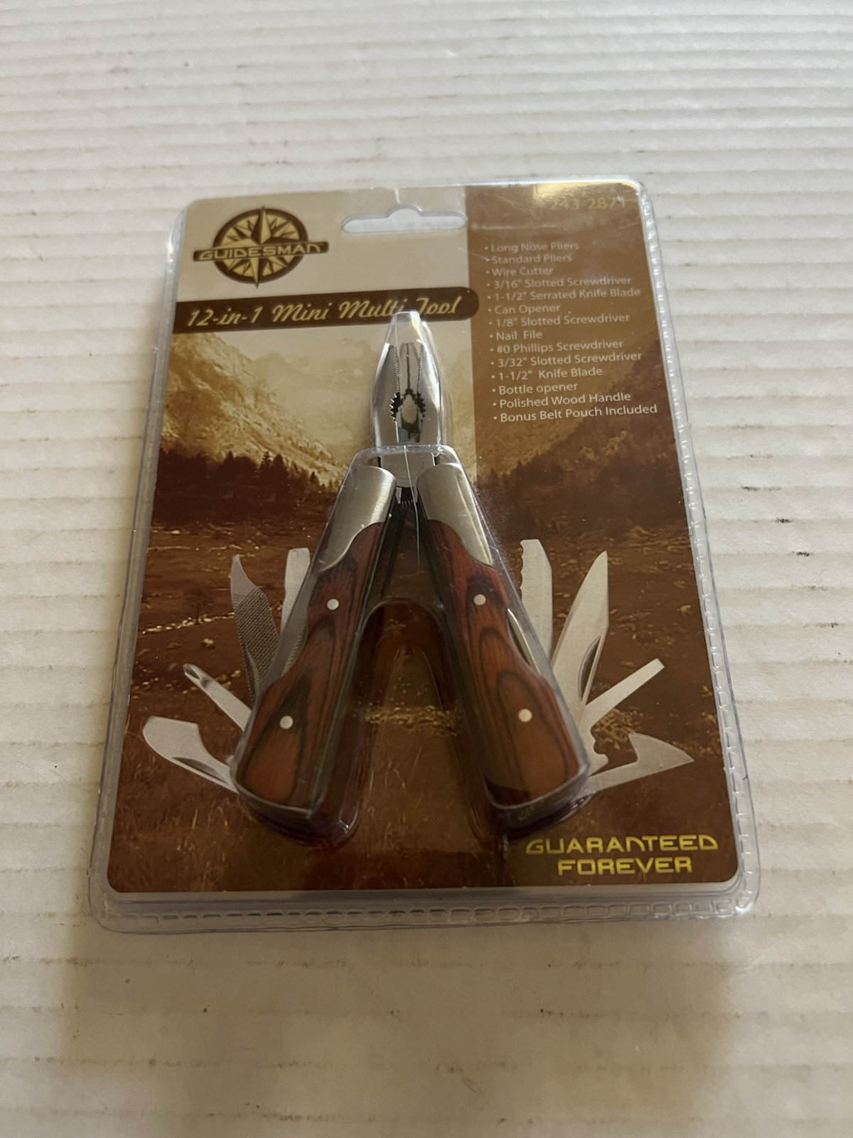 Sealed Guidesman 12 In 1 Mini Multitool With Black Sheath Walnut Handle