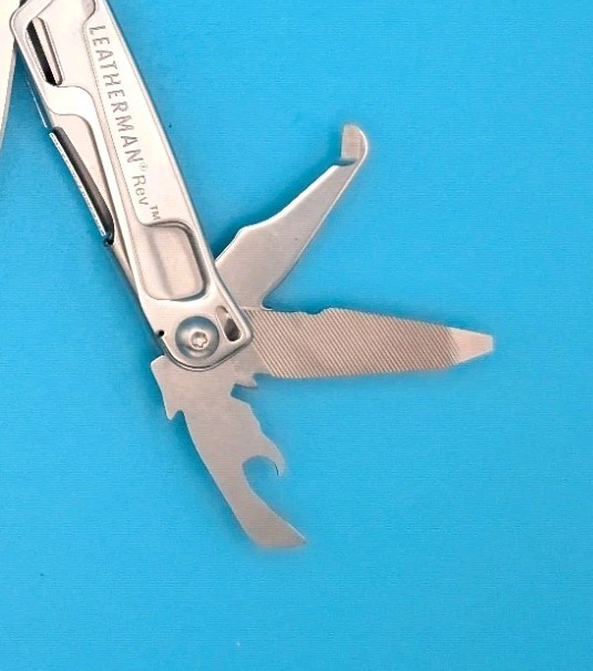 Leatherman Rev 3.8″ Multi-Tool, Stainless! With Sheath!