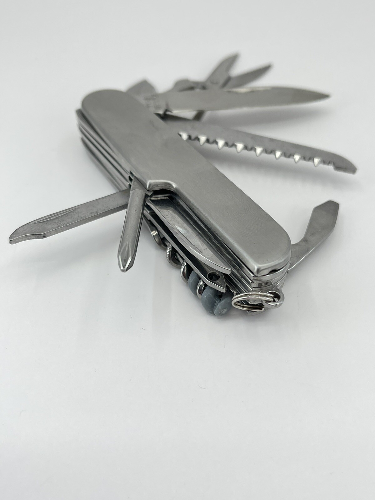 Younkers multi tool Pocket Knife can opener cork screw wood saw scissors file