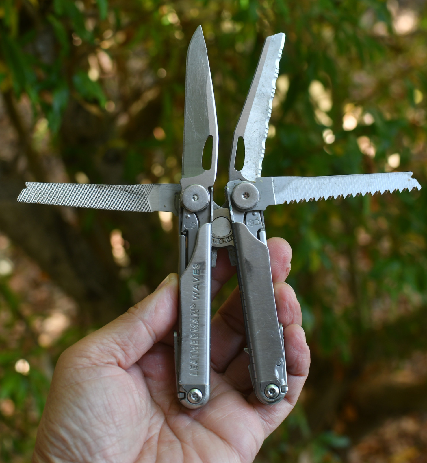 LeatherMan Wave Pocket Knife  Blades Rust