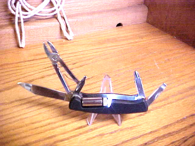 multi tool with LED flashlight Never used NEW BATTERIES