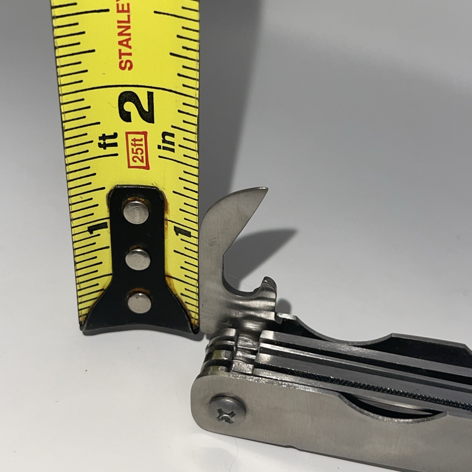 Multi-Tool Hammer Saw Serrated Knife Filer Hex Drivers Ruler Bottle Opener…