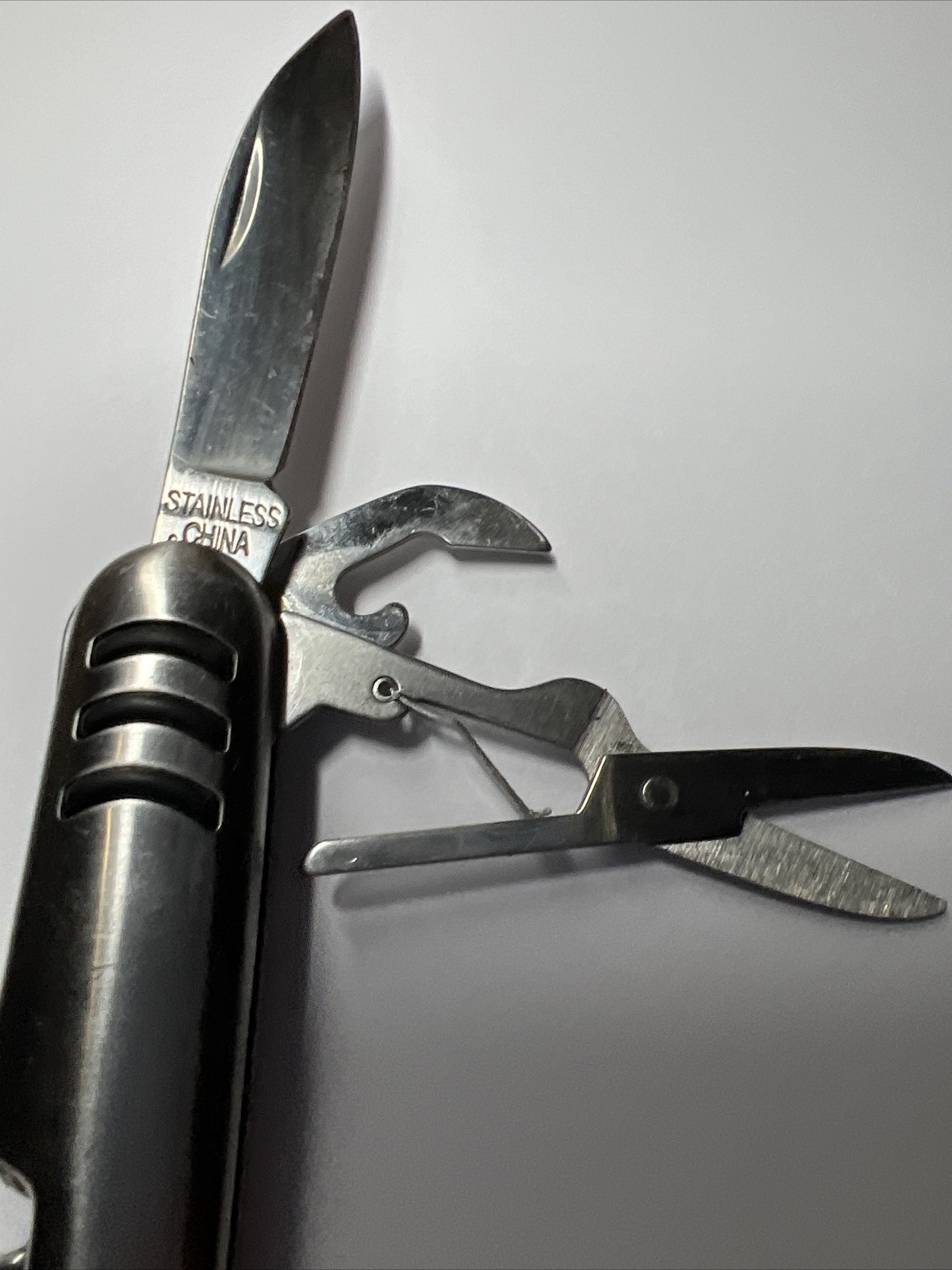Stainless Steel Multi Tool 7-in-1 Pocket Knife Can Opener Corkscrew Scissors