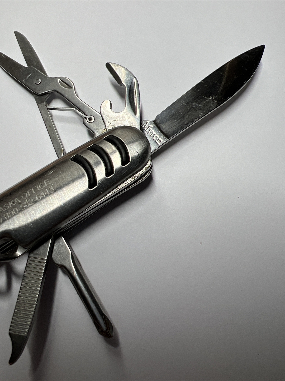 Stainless Steel Multi Tool 7-in-1 Pocket Knife Can Opener Corkscrew Scissors