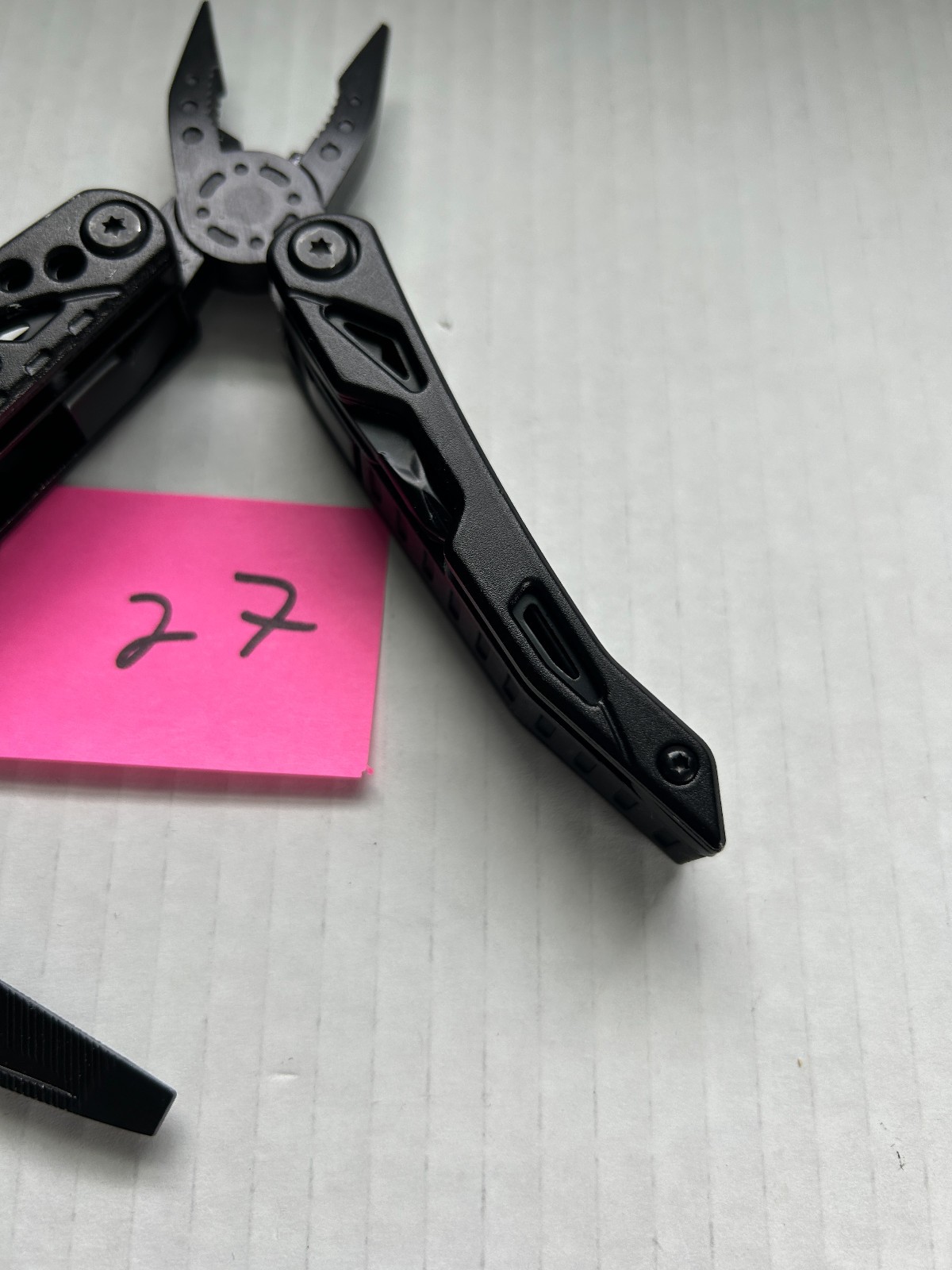 Pohaku Multi Tool with belt holder