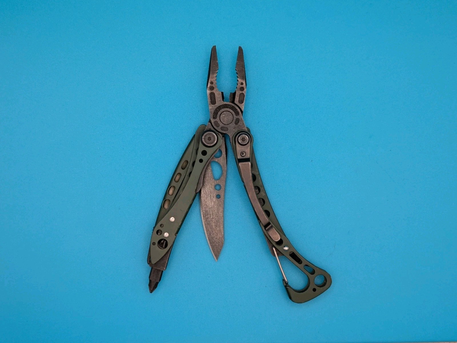Leatherman Skeletool CX Multitool Plain Edge Knife! Green!