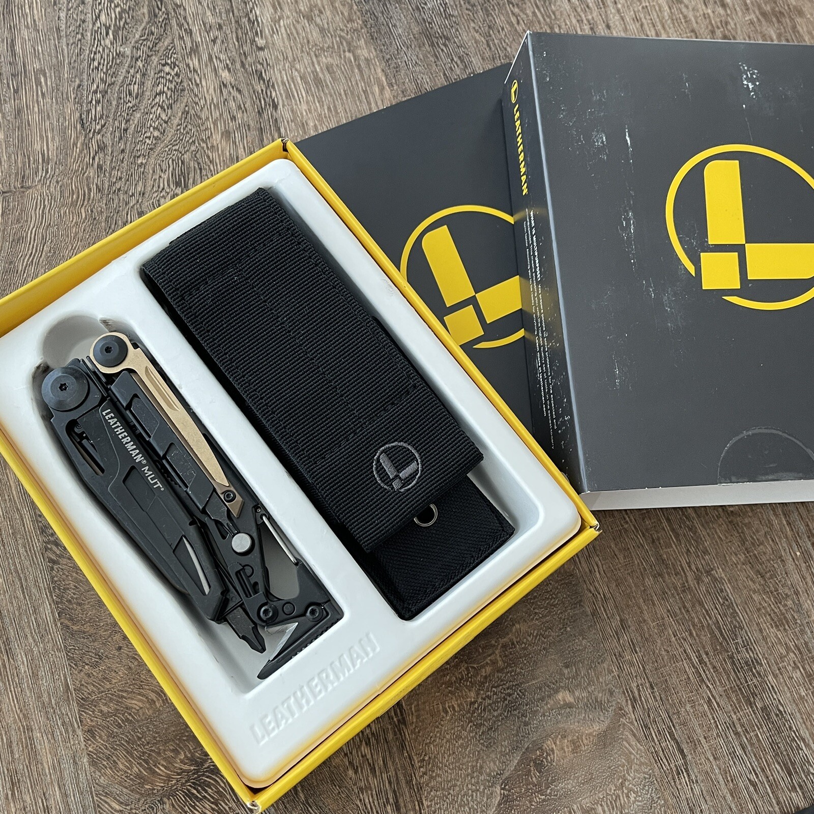 Leatherman MUT Black multi tool, black molle sheath. Brand new