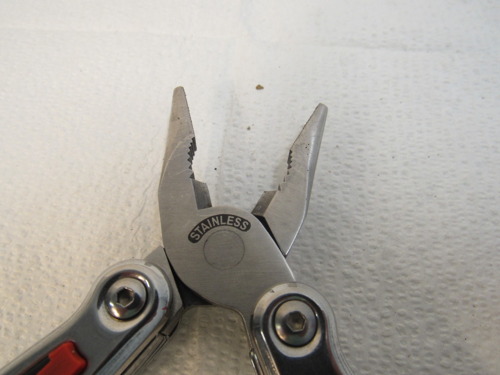 Radio Shack Multi-Tool Stainless Steel With Belt Case Red, Black, Stainless