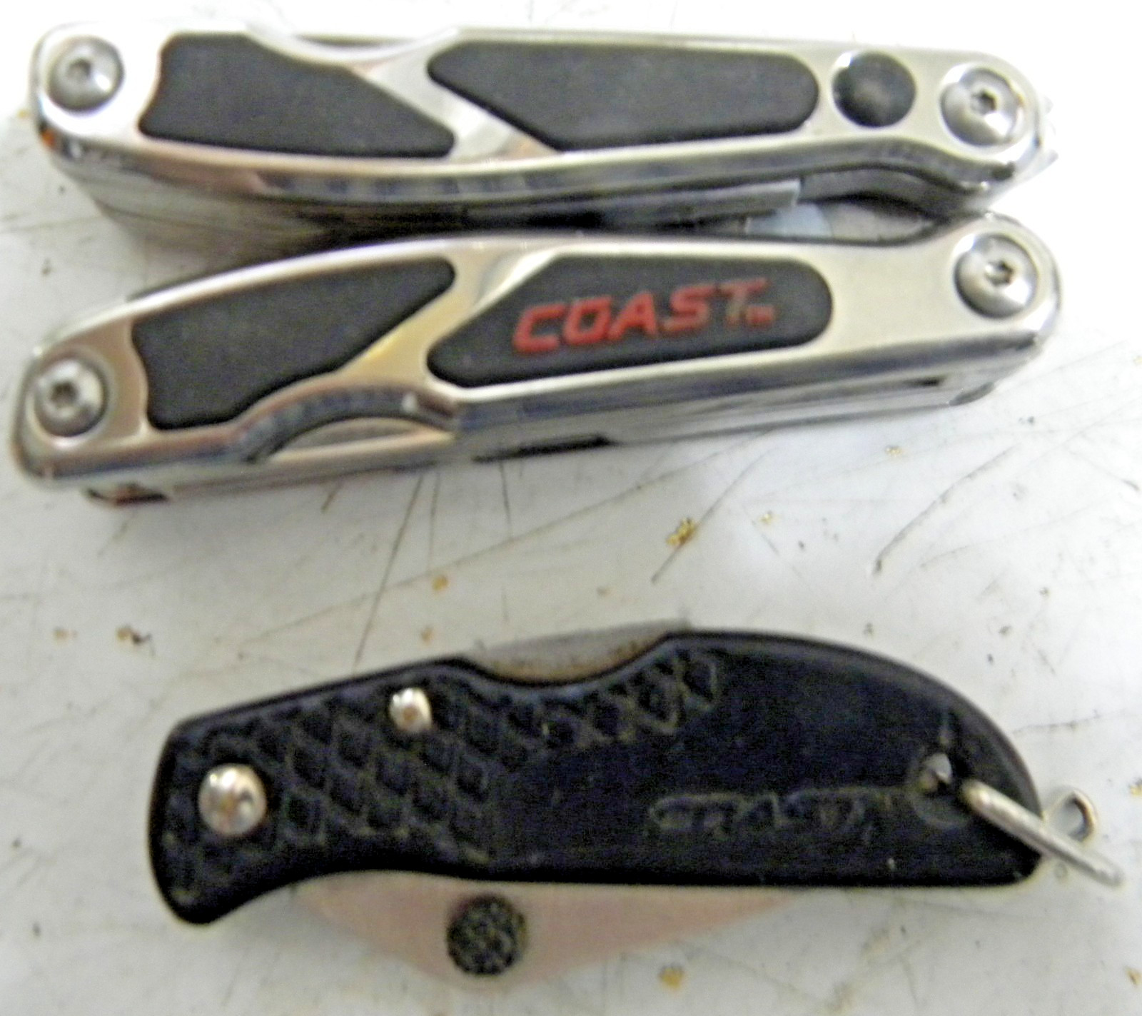 COAST Mini Multi Tool Silver and Black with built in LED and a Pocket knife