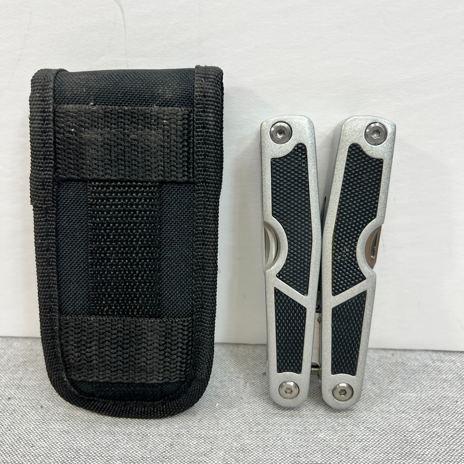 Ozark Trail Multiforce Multi-Tool Stainless Steel Plier Knife Saw Sheath
