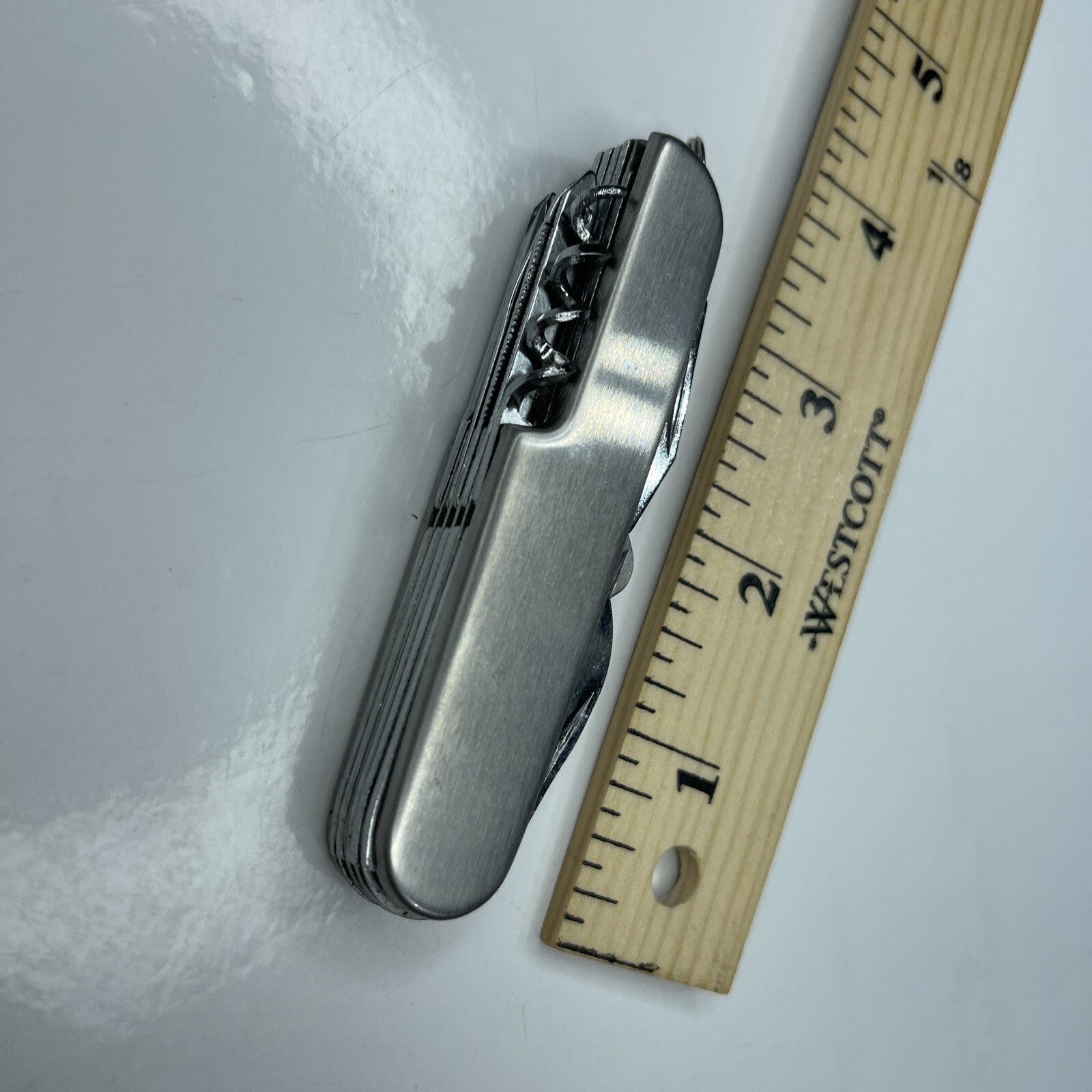 A Silver Tone Folding Utility Pocket Army Knife Stainless Scissors Cork Opener