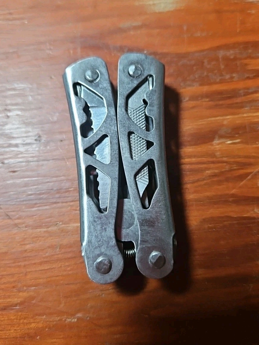 New! Stainless Steel Multi tool, Pliers, Wire Cutters, Screwdrivers, etc….