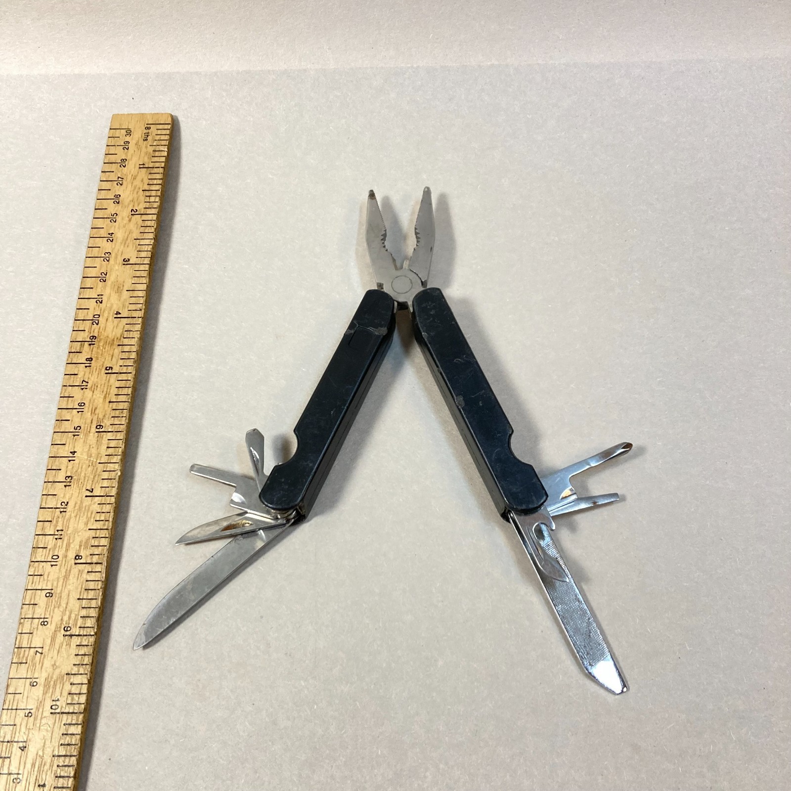 Folding Multi Tool 9 Functions w/ Knife Pliers Screwdrivers