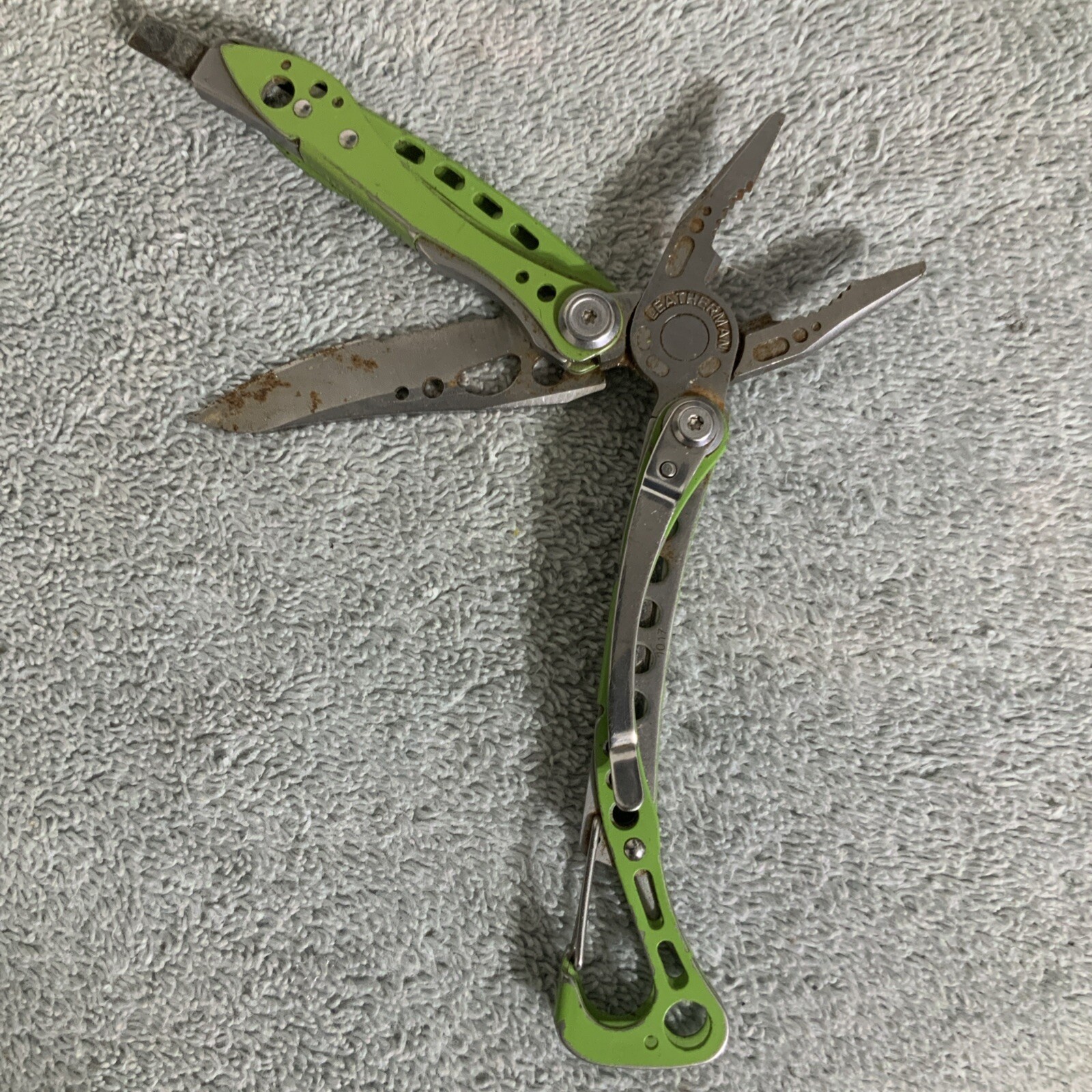 Retired Leatherman “Skeletool Lime Green” Stainless Steel Multi Tool Rust – J11
