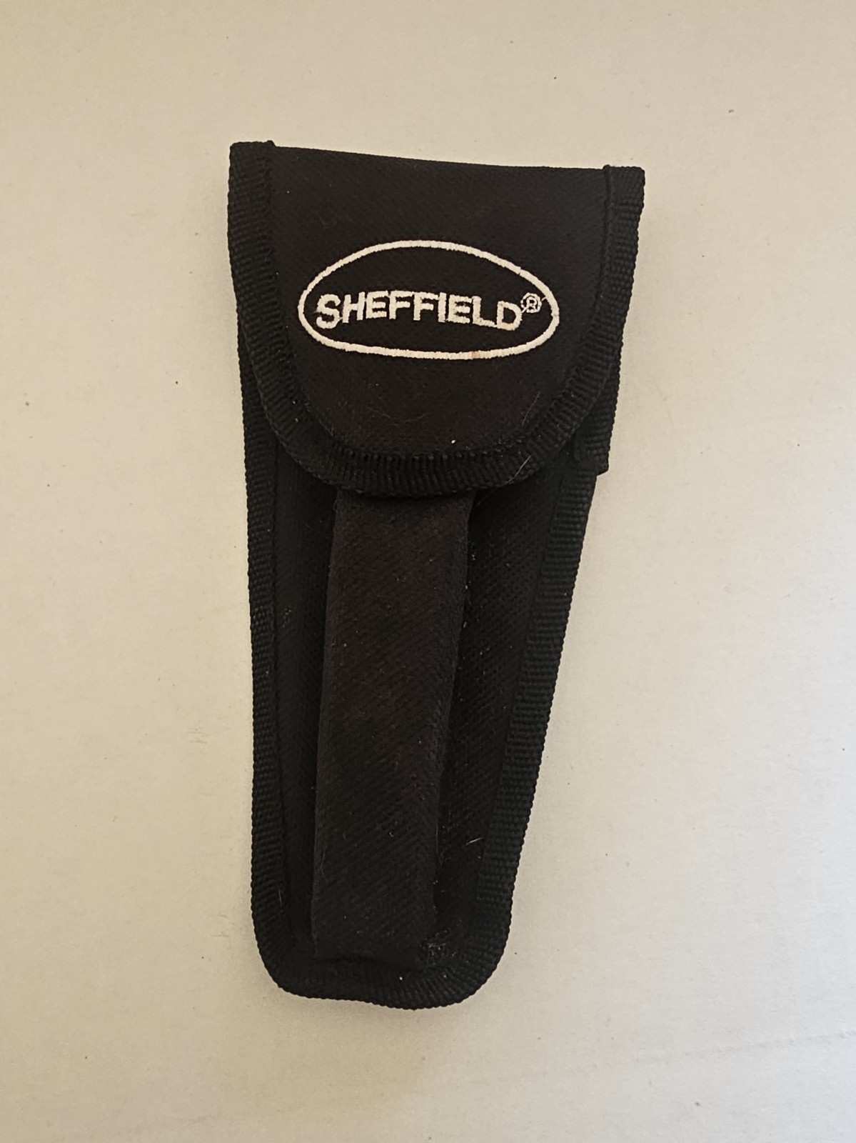 Sheffield 12301 Camper 12-in-1 Multi-Tool featuring a dual axe head and…