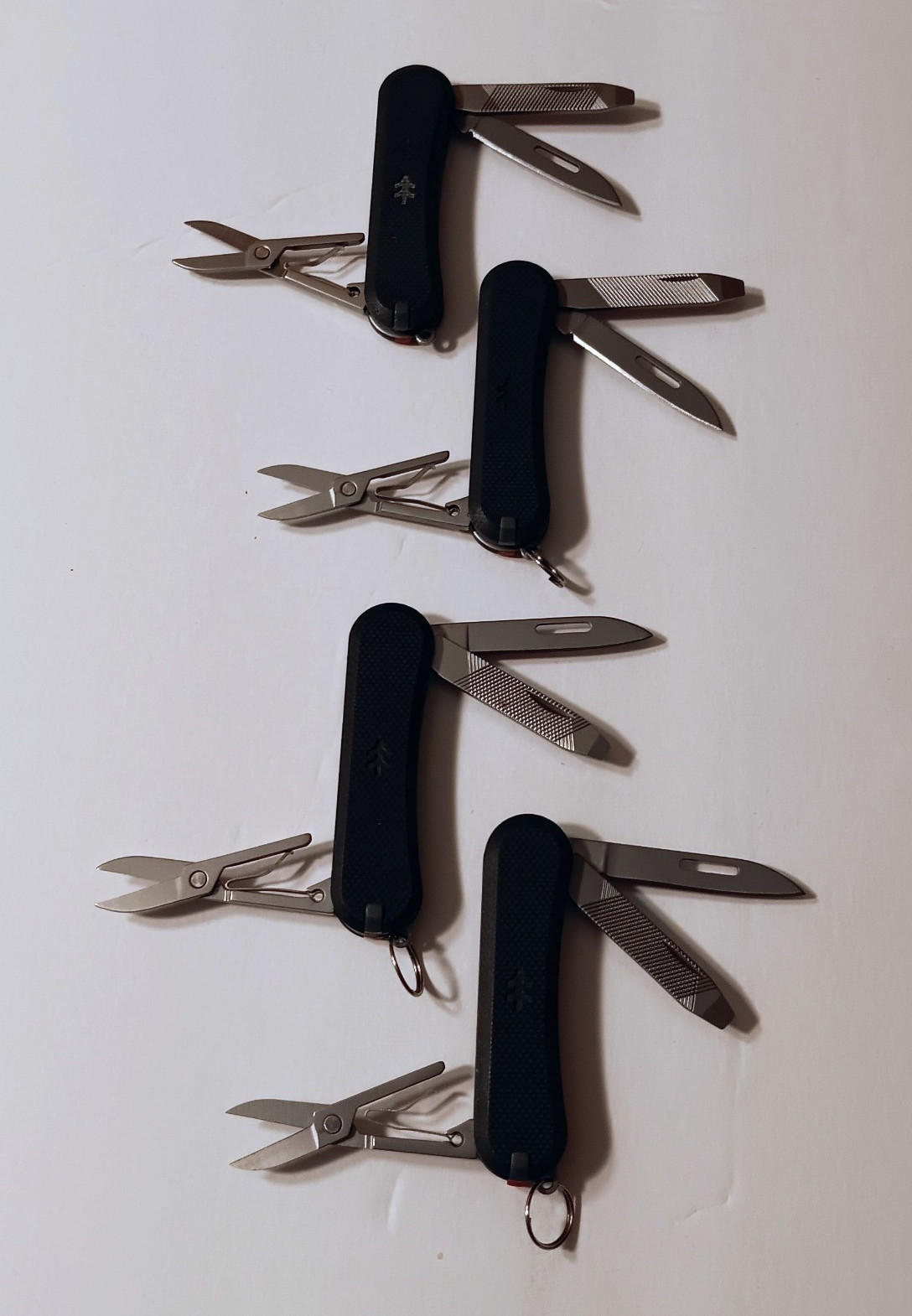 Swisstech ST50022 Multi-Tool Lot of 4 Knife/File/Scissors/Tweezers Keyring