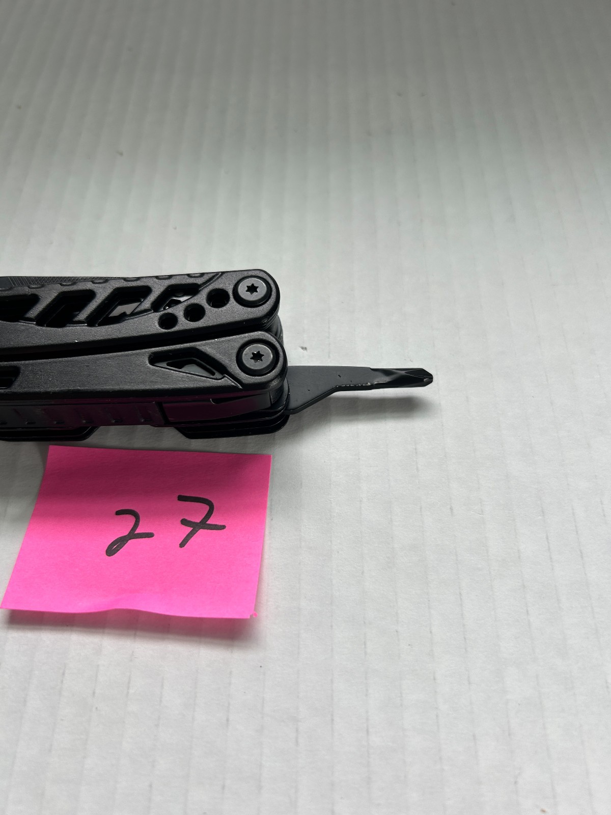 Pohaku Multi Tool with belt holder