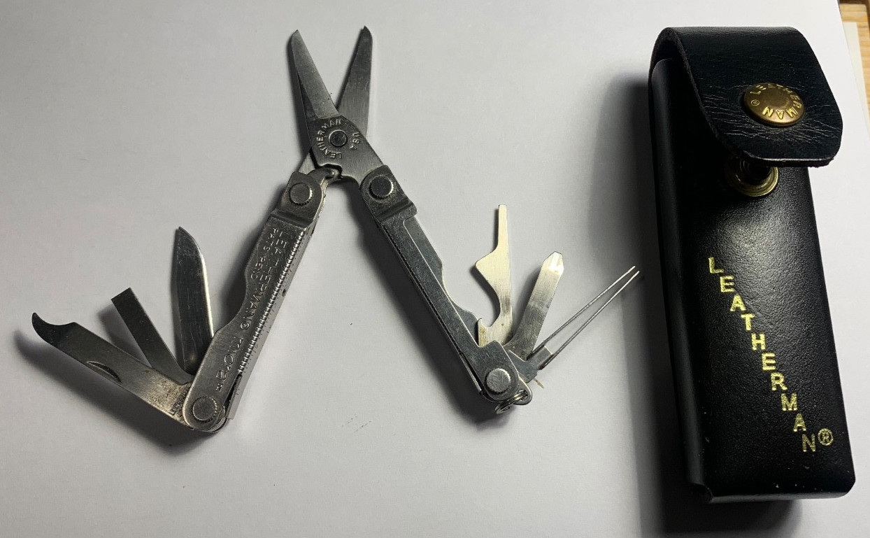Vintage Leatherman Micra multi tool with Leather Sheath