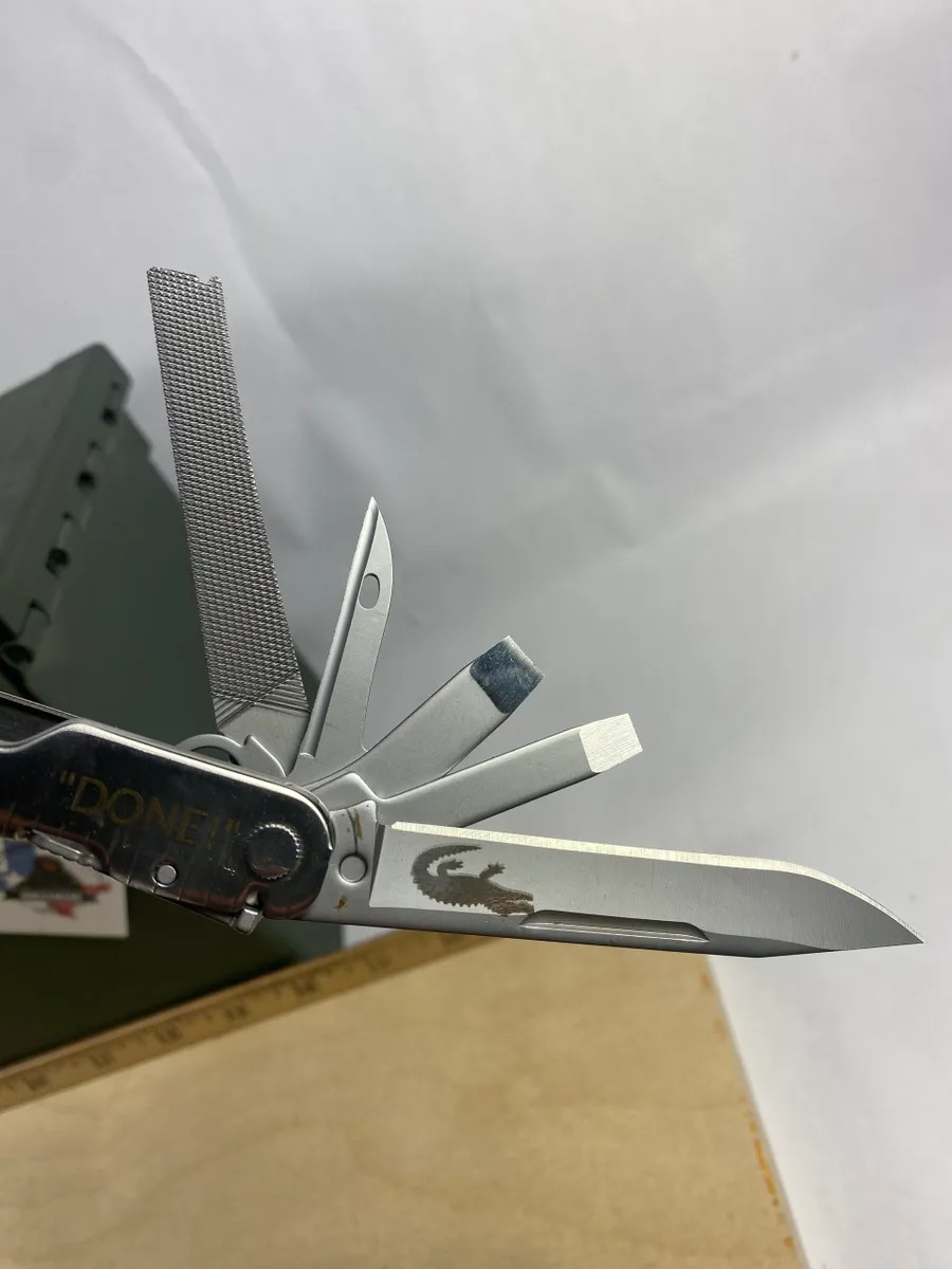 Leatherman Super Tool 300 LST#5. Looks/feel brand new. Handle customized, dirty