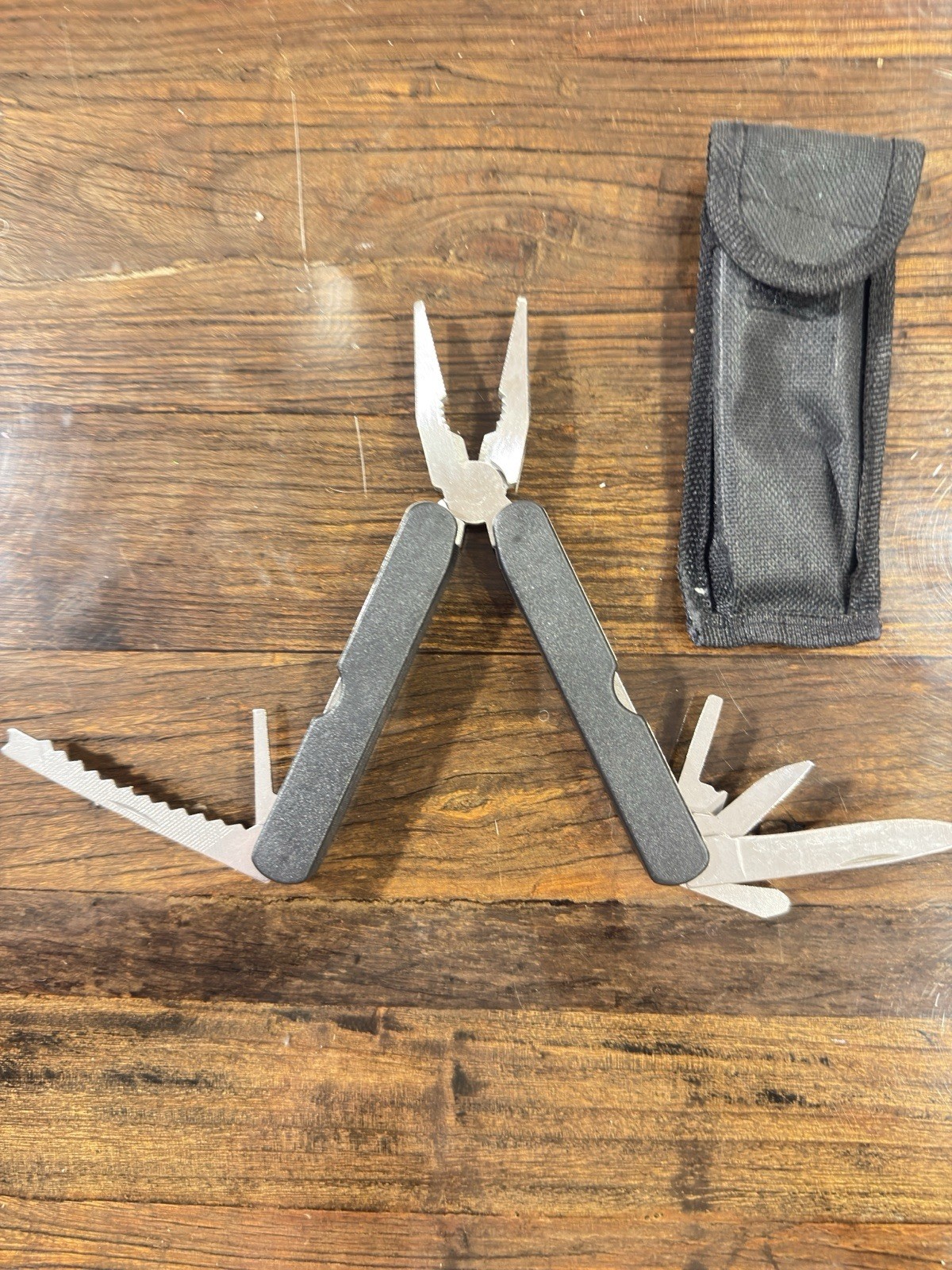 12 Multi-Tool w/ Pliers Pocket Knife, Saw.