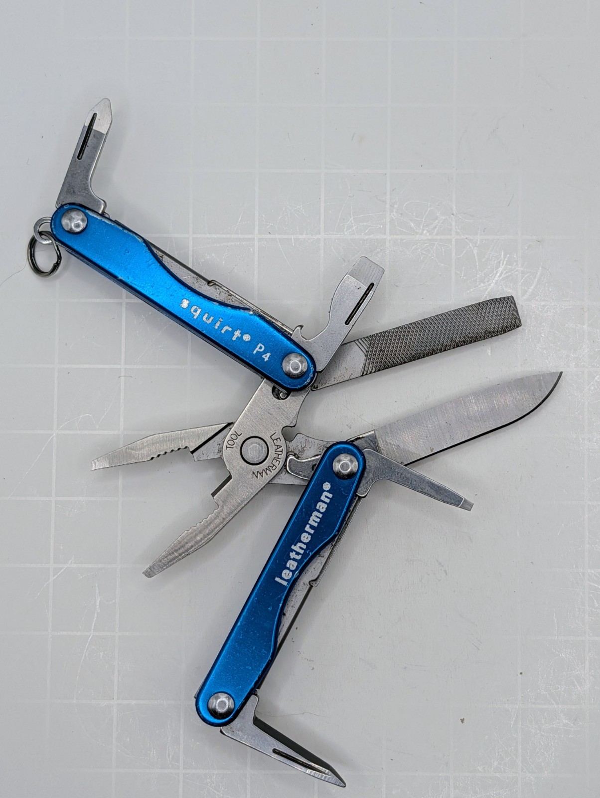 Vintage Leatherman Squirt P4 Rare Retired Beautiful Blue Anodized