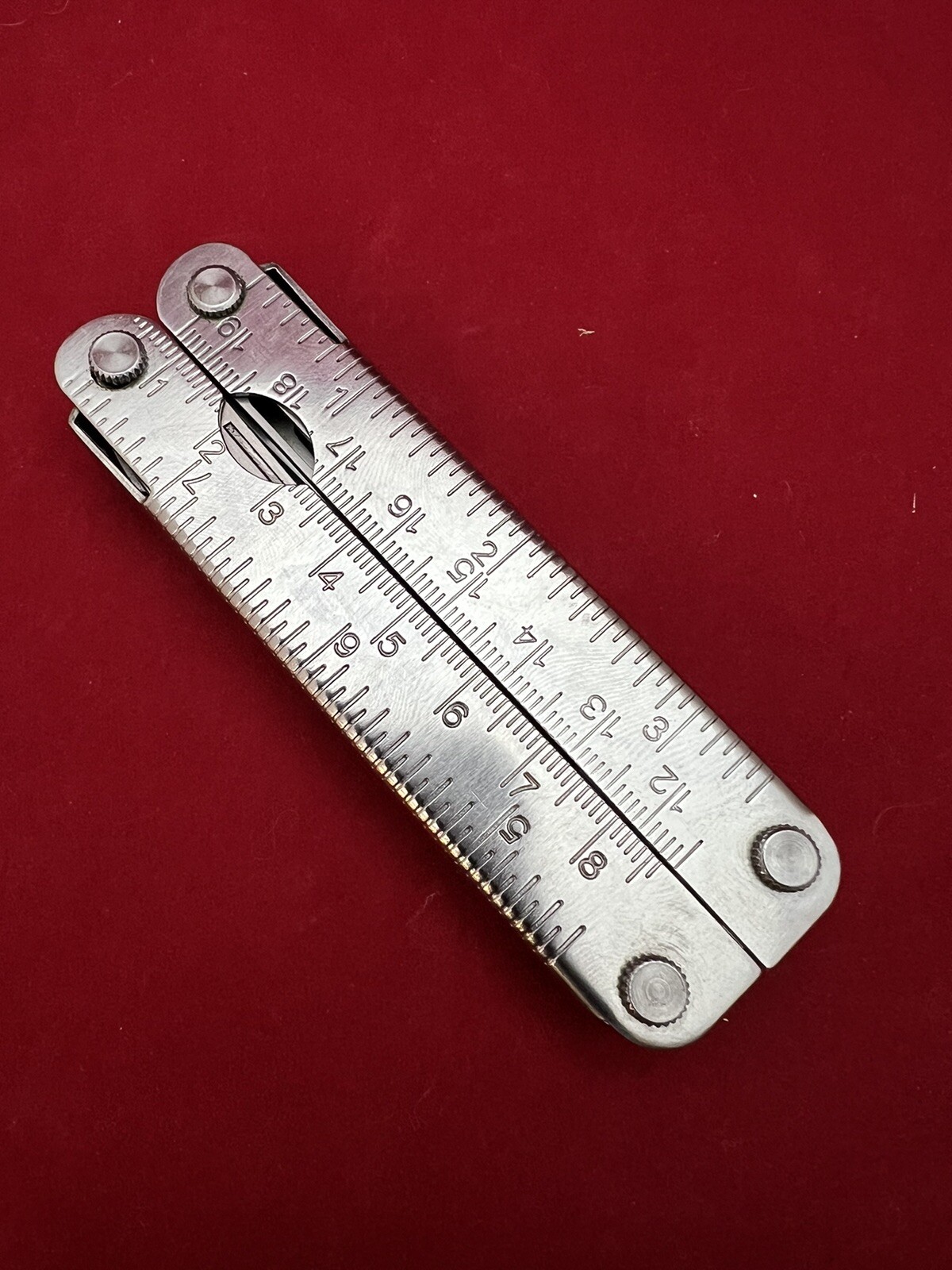Stainless Steel 12-in-1 Multi-Tool – Pliers Knives Screwdrivers File Saw Opener