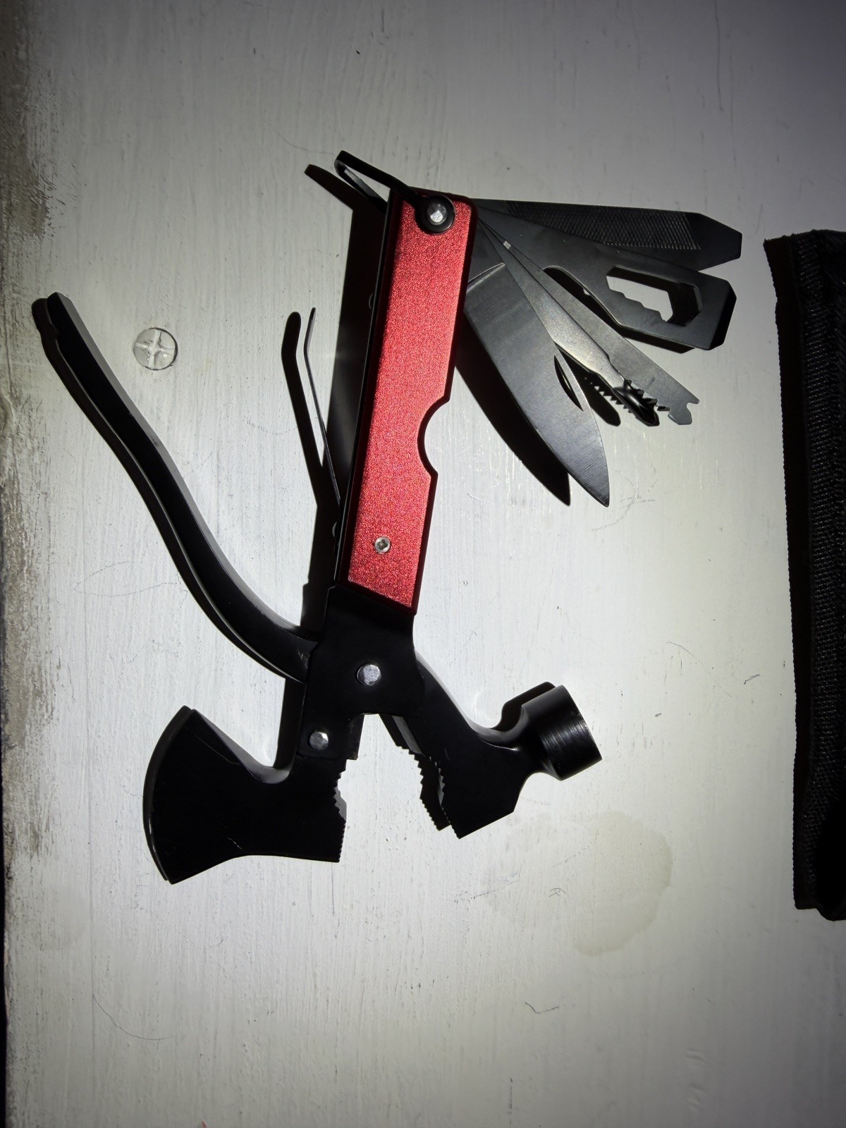 14-in-1 Outdoor Multitool Hammer – Survival Gear with Axe, Knife, Pliers.