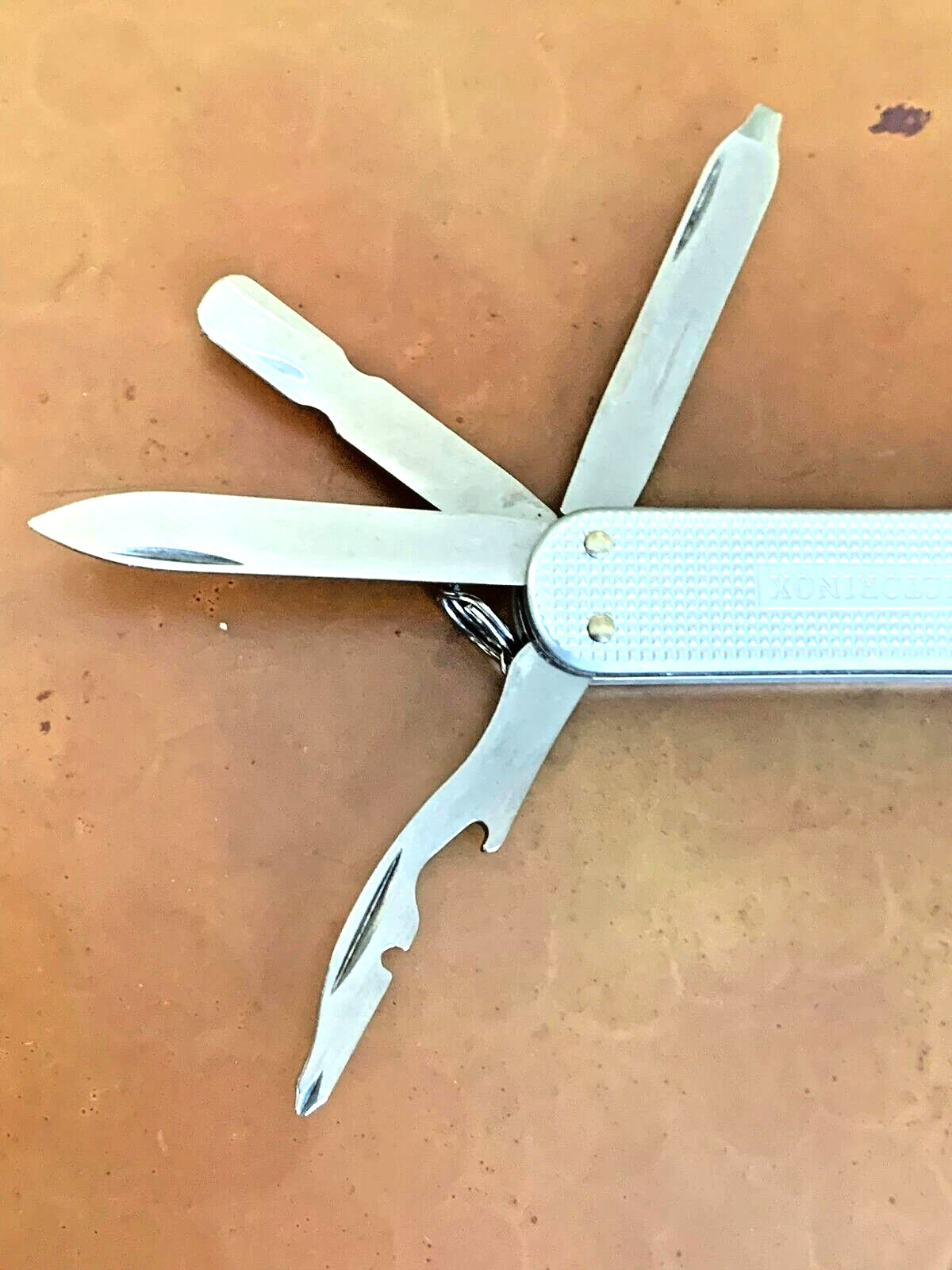 Victorinox MiniChamp Alox Swiss Army Knife, Silver Textured Scales, 14 Tools