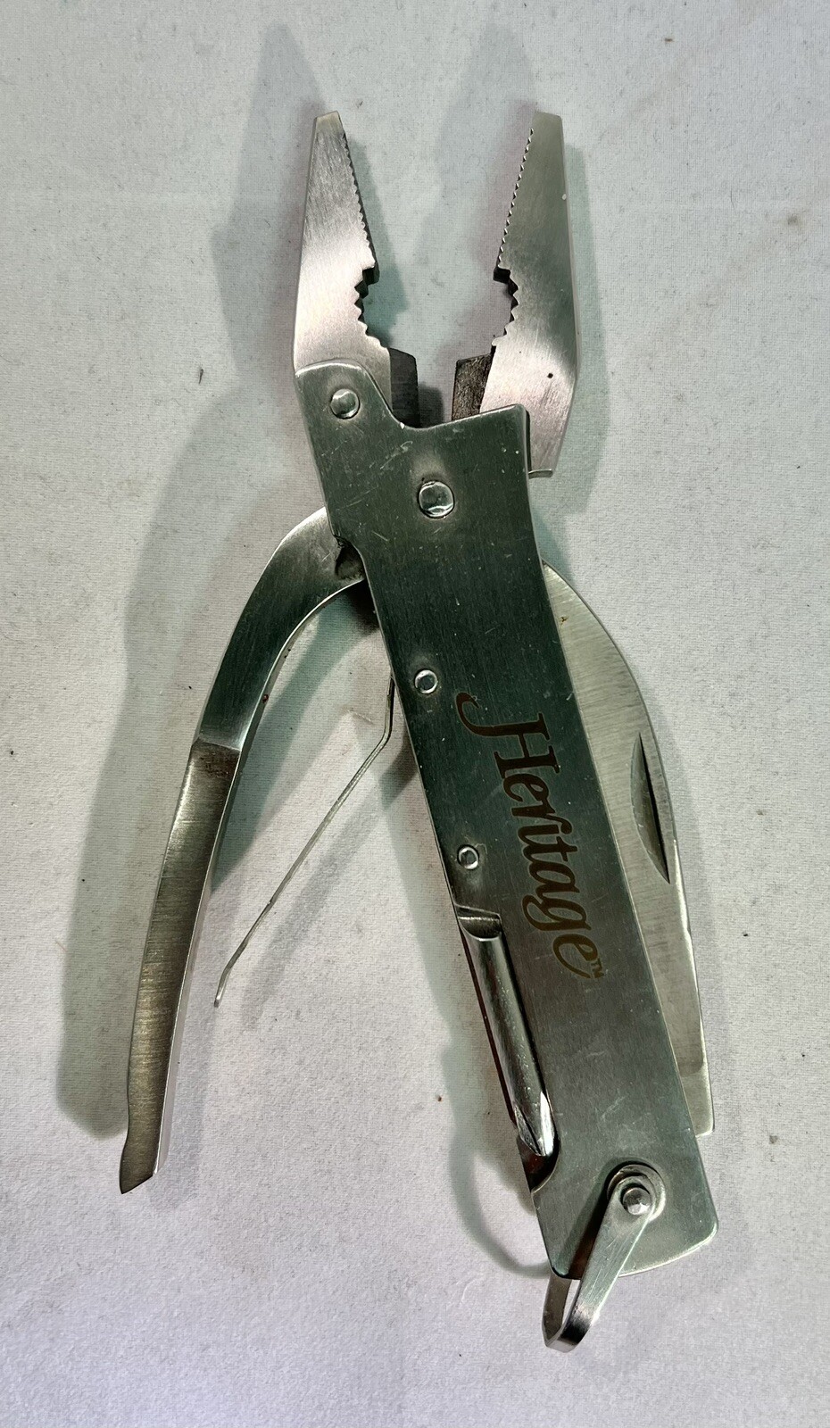Unique Heritage Multitool W/case (Pliers, Blade, Opener, Saw, Wire Cutter)