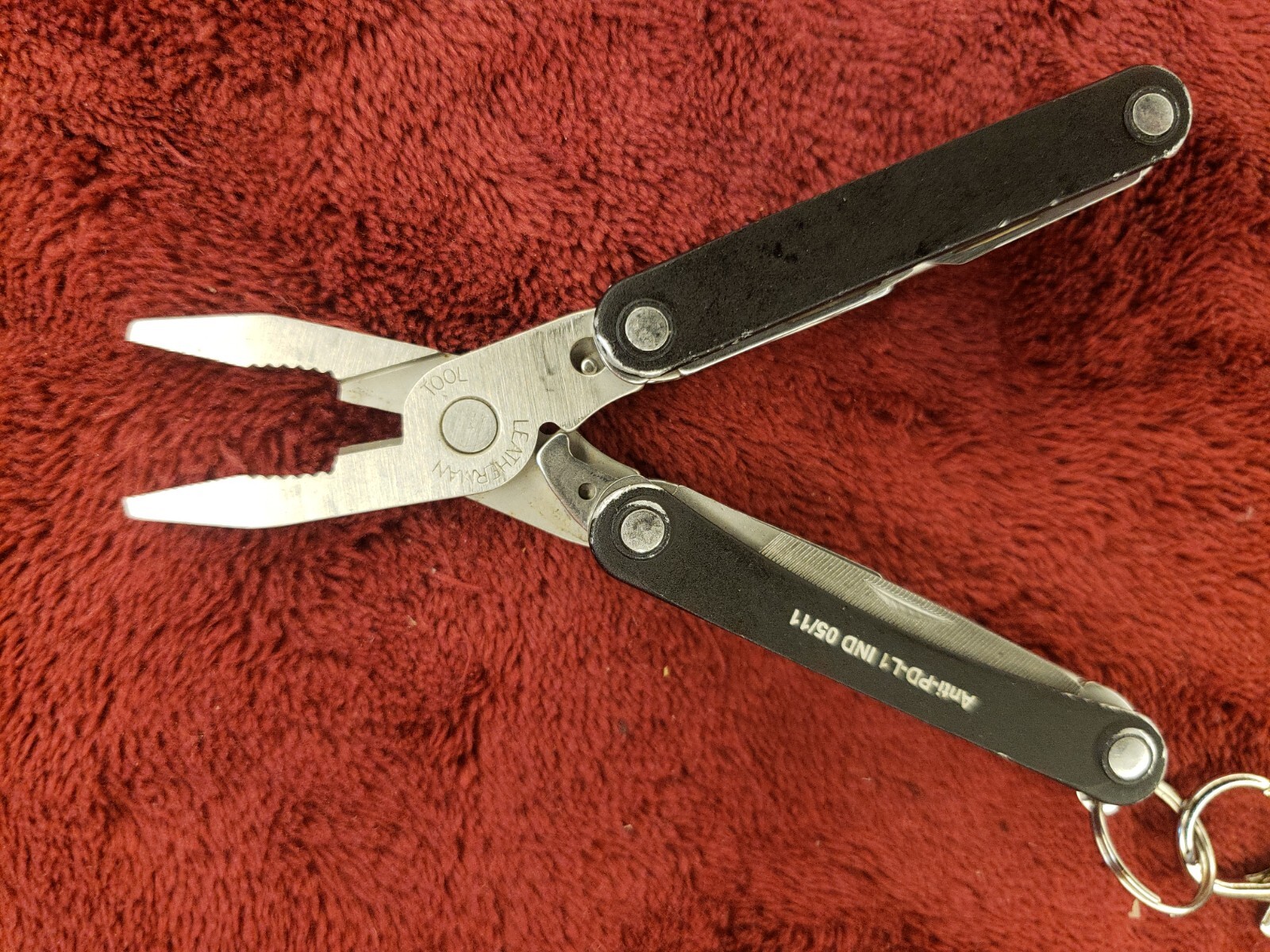 Leatherman Squirt PS4 Multi-Tool Black Keychain Anti-PD-L1 IND 05/11 print