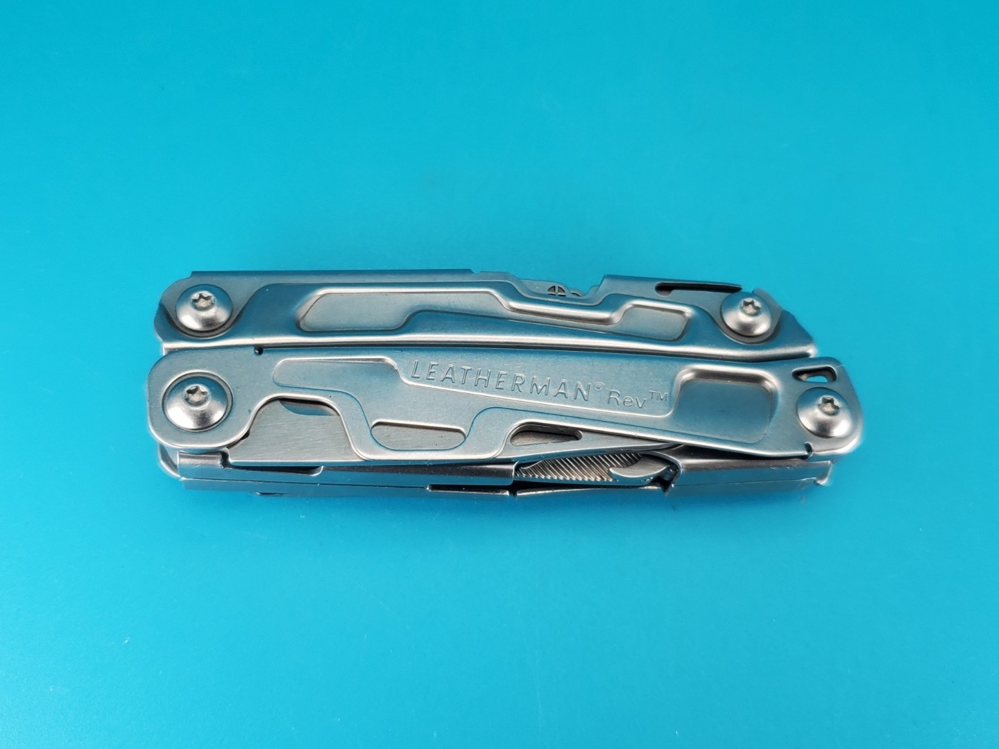 Leatherman Rev 3.8″ Multi-Tool, Stainless! *CHIPPED BLADE TIP*