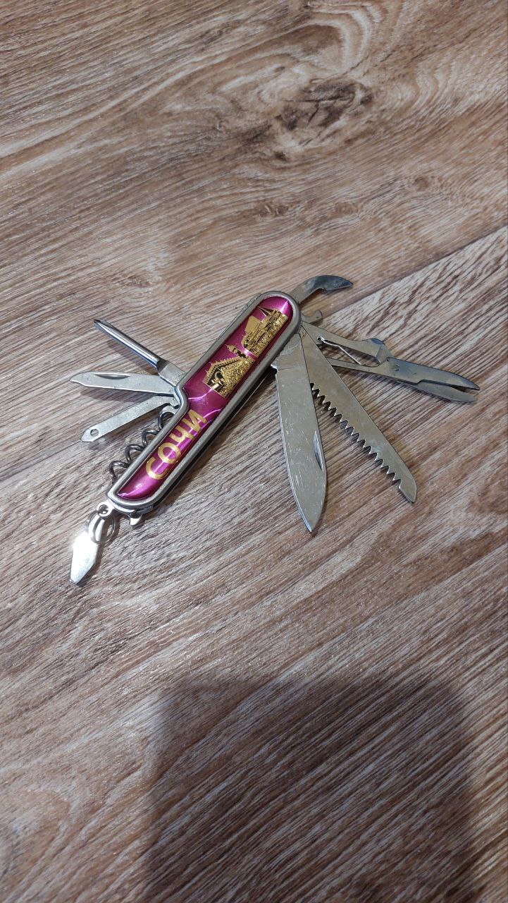 Tourist multitool knife 10 in 1, knife, corkscrew, screwdriver, scissors. Sochi