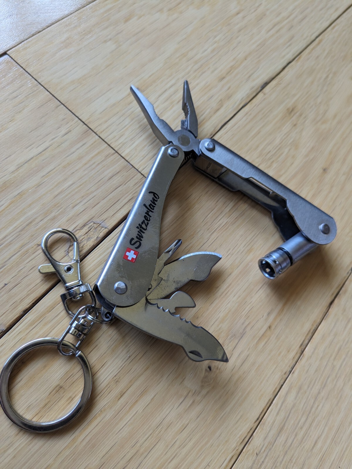 Swiss-Made Foldable Pocket Multi-Tool Stainless Steel w Pocket Clip. 8 Functions