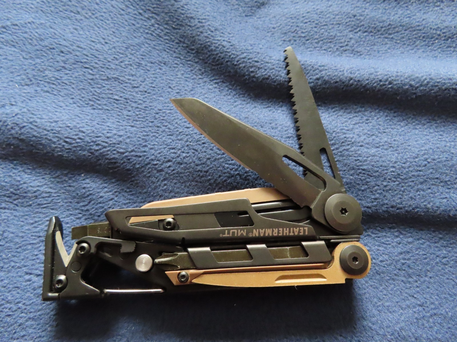 Leatherman MUT Black Titanium Clip multi tool brown sheath. 10/2011