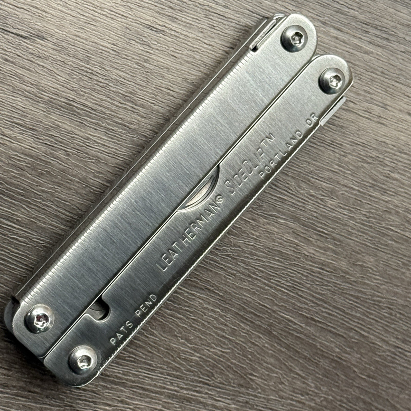 Leatherman Sideclip multitool. Mint. Late Run: shiny factory polished