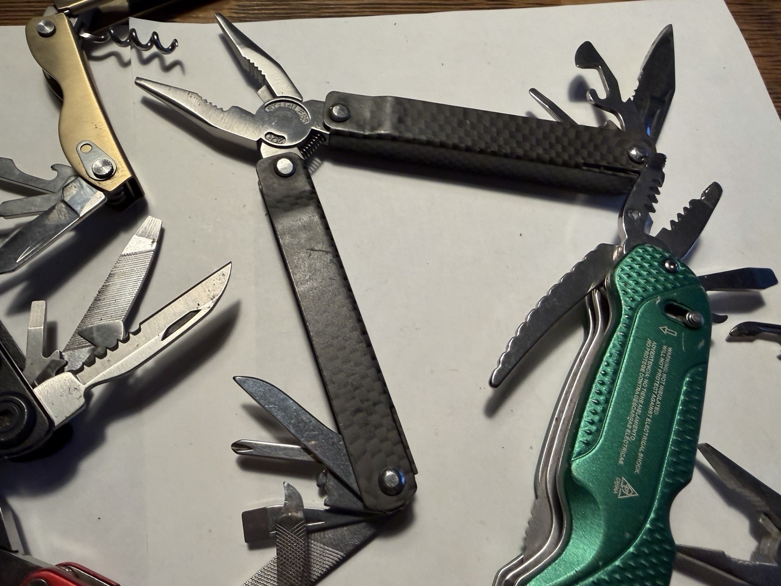 Great Deal! Lot Of 7 Multi Tools Electricians Pliers Cork Screw Blade File Etc
