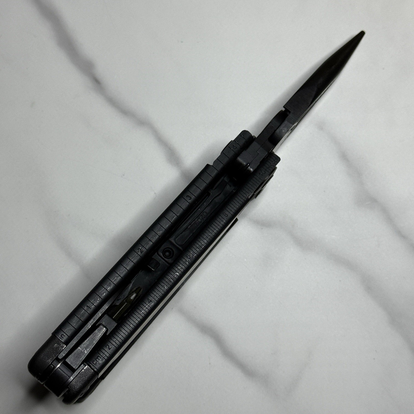 Leatherman Surge Cap Crimper Black Multitool w/Molle Sheath. Discontinued