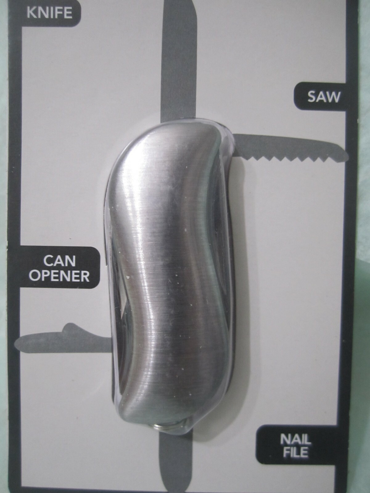 Green brier Pocket Tool Use Knife , can opener , Saw ,Nail File Silver 4 uses.