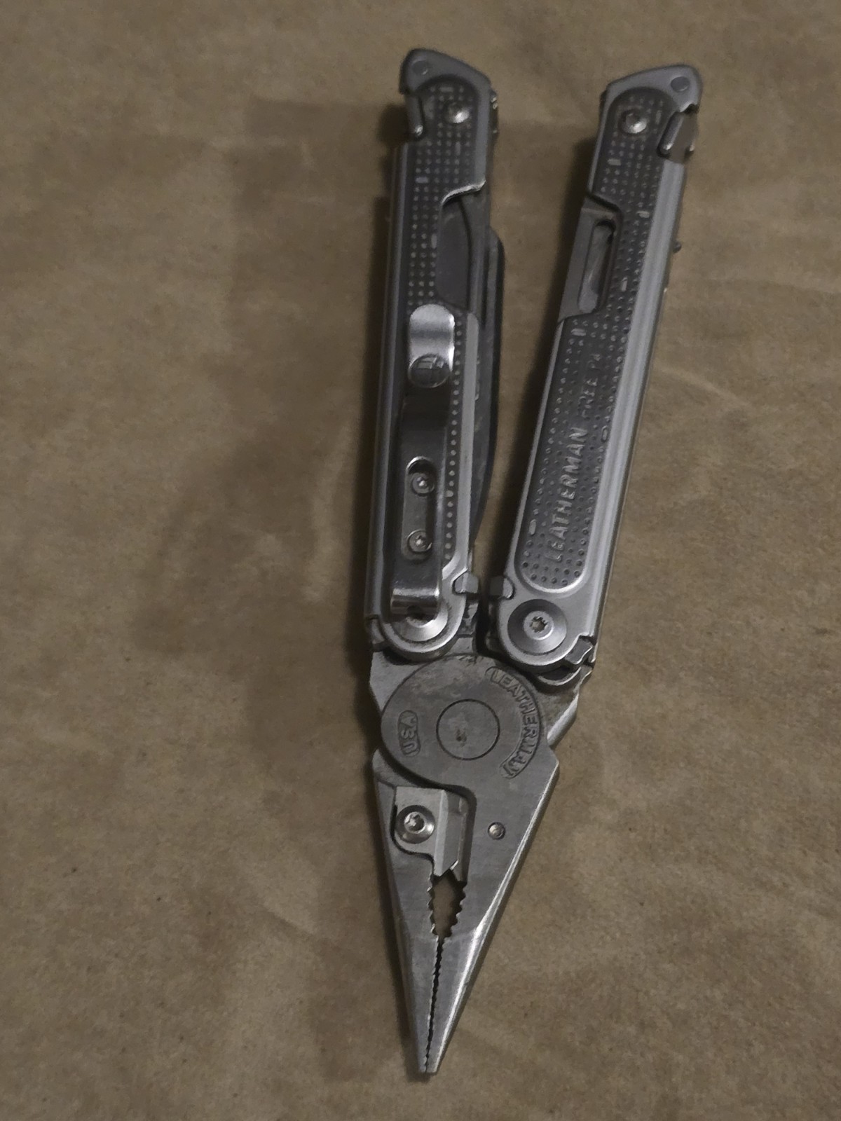 Retired Leatherman Free P4 Multi-Tool With Sheath and Donk Titanium Pocket Clip