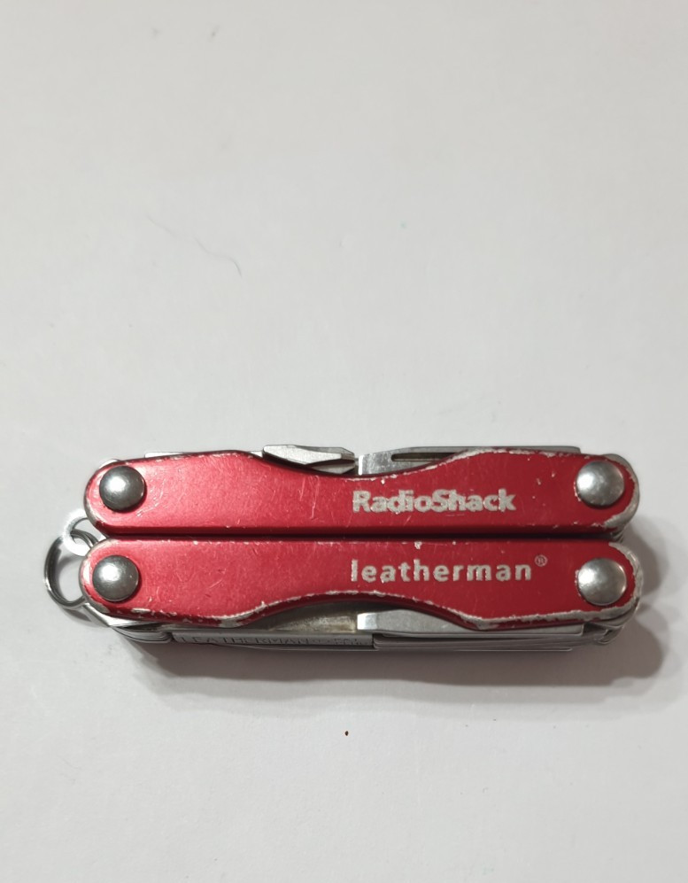 🔥 Leatherman Squirt E4 Stainless Multitool Red Rare Retired RadioShack