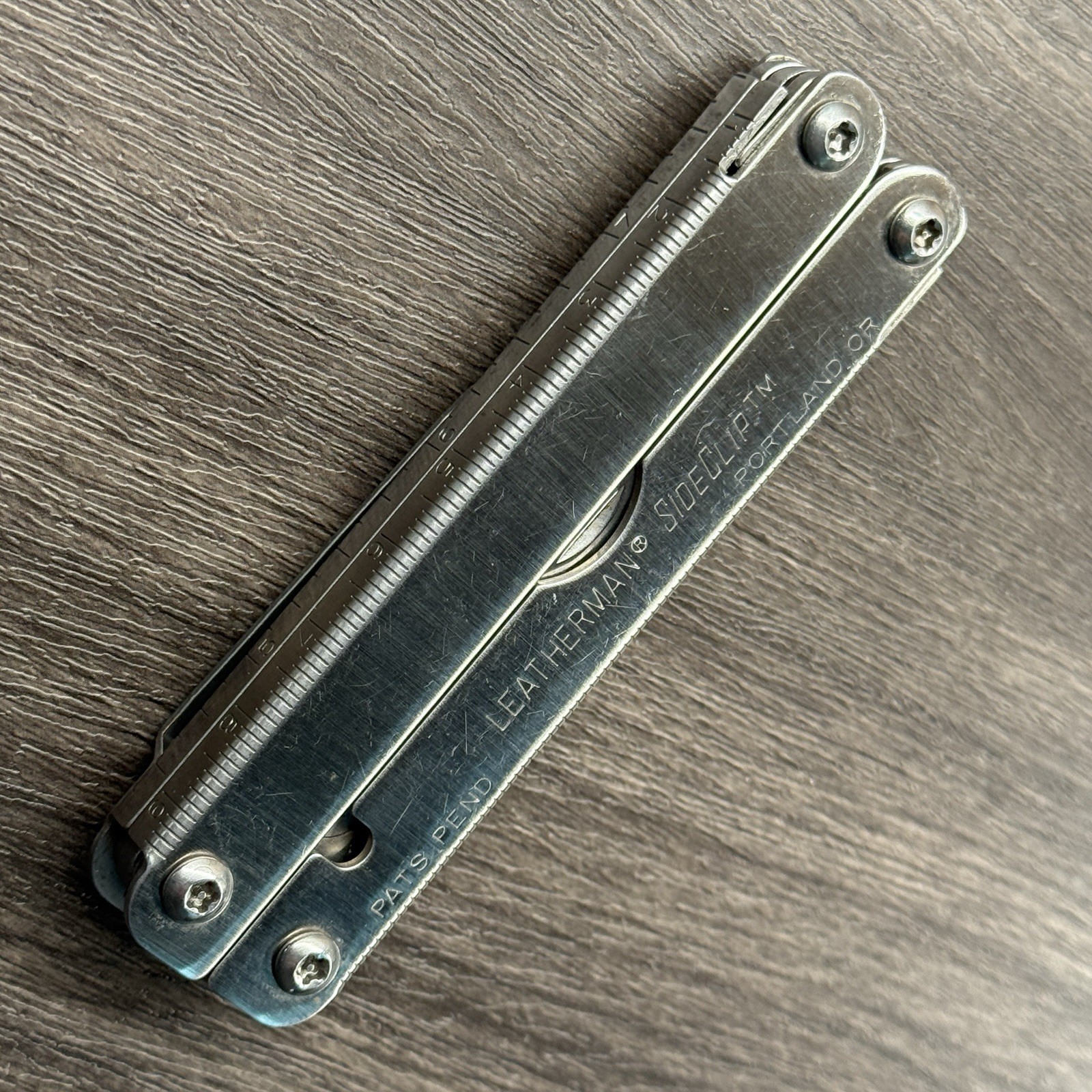 Leatherman Sideclip multitool. Lightly used. Late Run: shiny factory polished