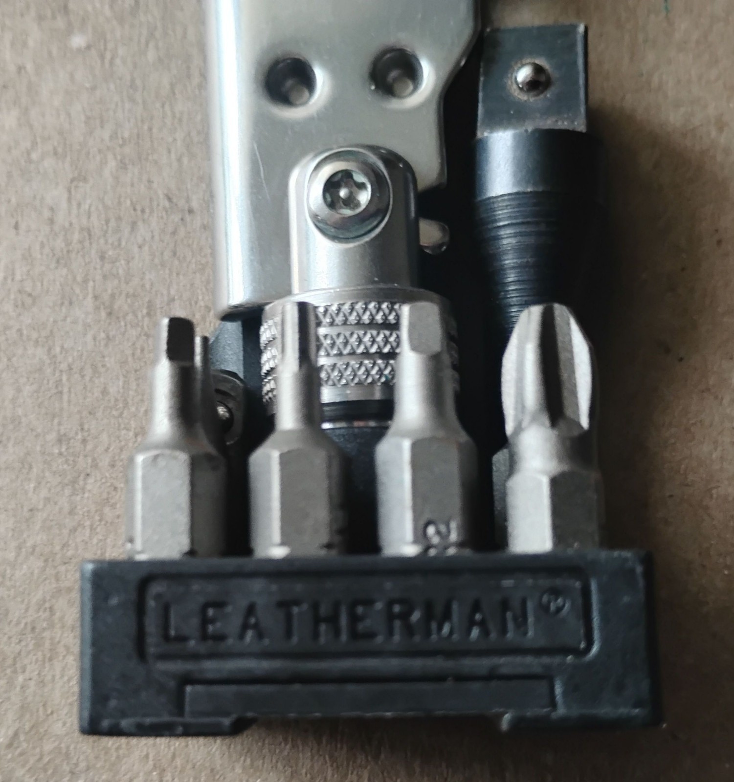 LEATHERMAN TOOL ADAPTER WITH LEATHER CASE-8 BITS-INCLUDES 1/4 & 3/8 SOCKET DRIVE