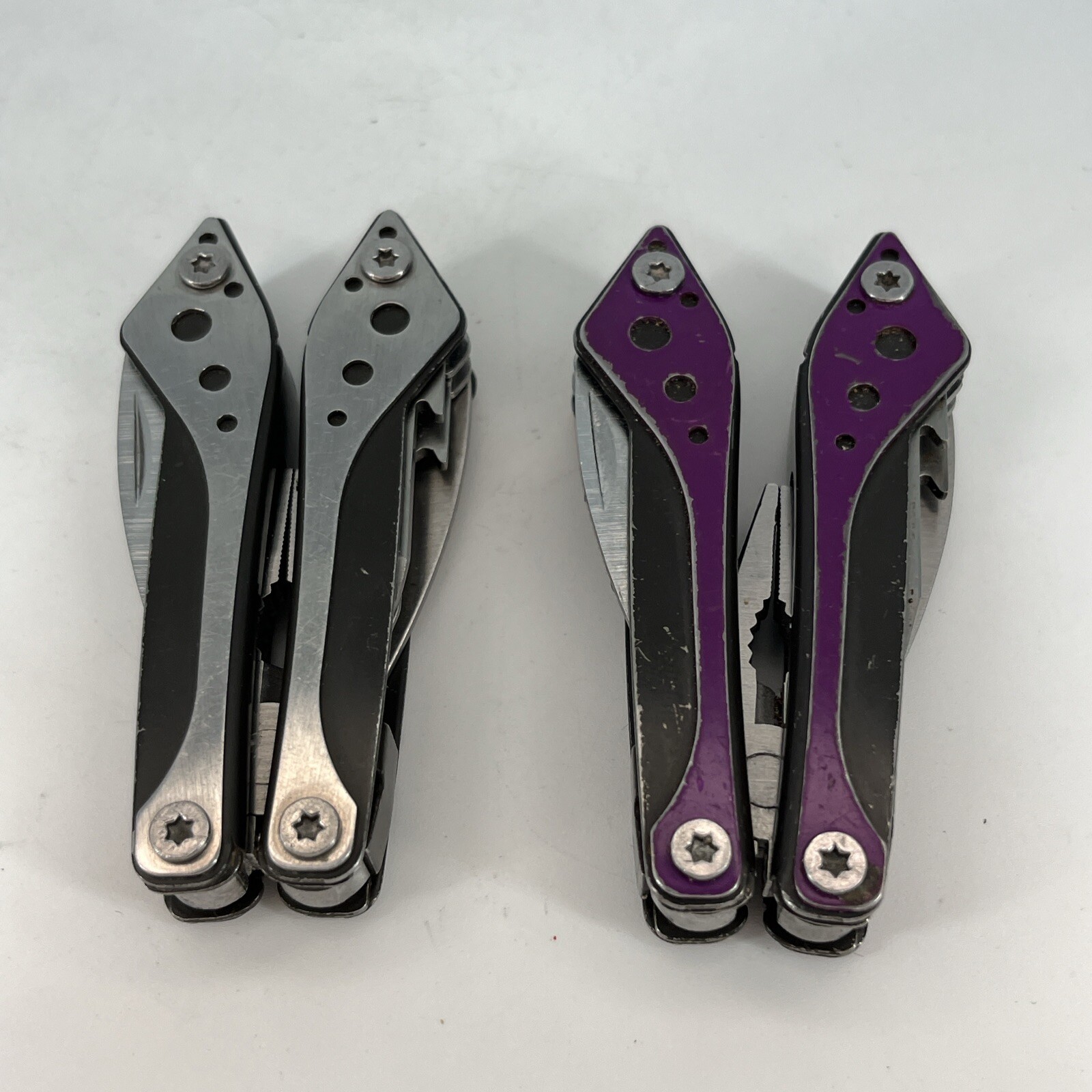 LOT OF 2 Cabela’s PURPLE & SILVER Mini MultiTool Spring Open Pliers Scissors Saw