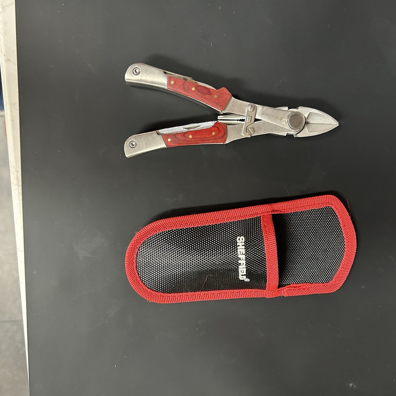 SHEFFIELD #12704 STAINLESS STEEL FOLDING PLIERS & MULTI TOOL KNIFE SAW